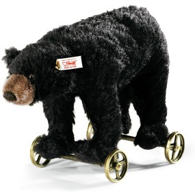 Retired Steiff Bears - BLACK BEAR ON WHEELS 21CM